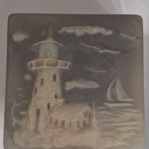 Gray and Cream Lighthouse Art Piece